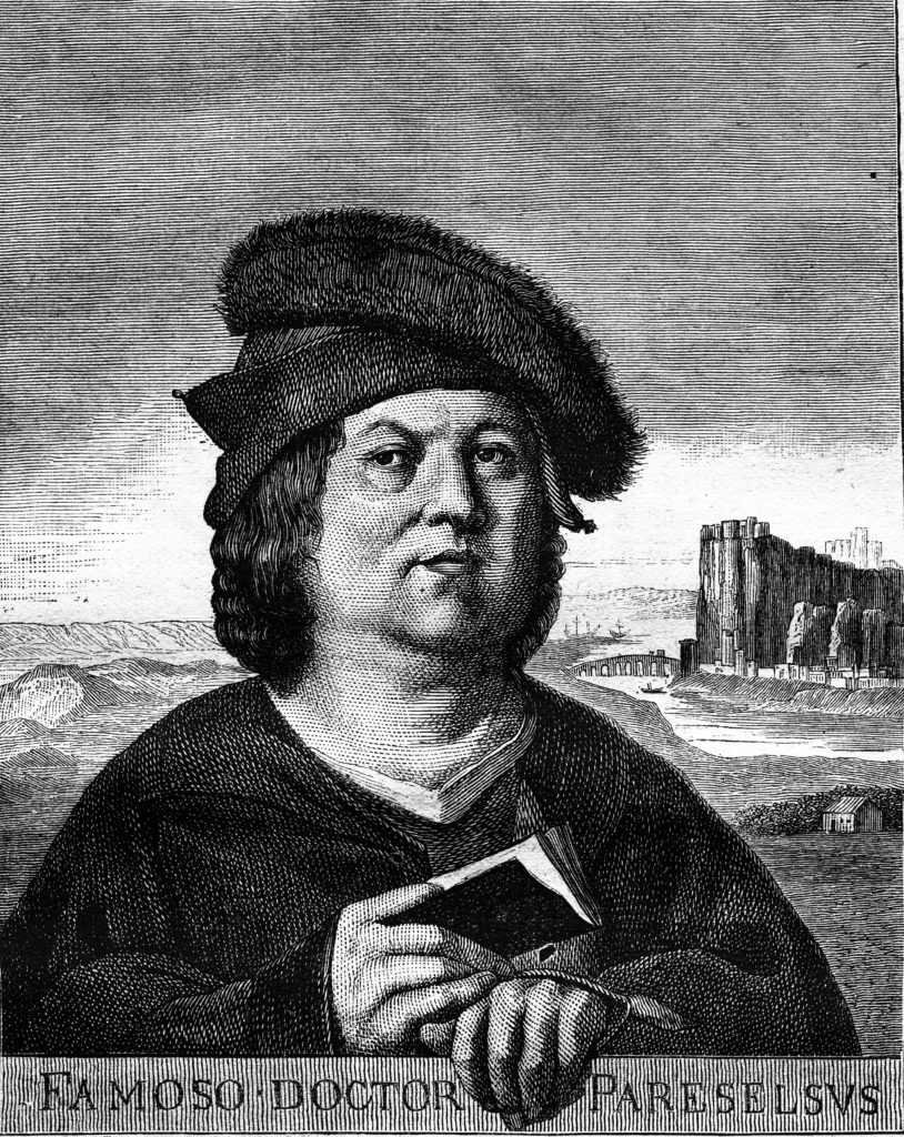 Bild von Paracelsus, der Begründer der modernen Spagyrik, mit Buch in der Hand in schwarz-weiß